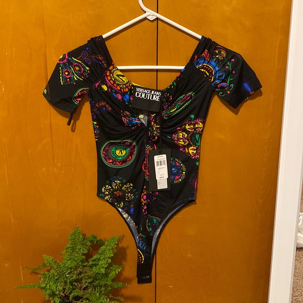 I am selling body fit slim shirt. Size 36 brand Versace jeans couture.